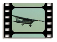 Cessna 182 with flaps down for landing